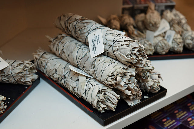 Rolls of white sage on a shelf