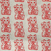 Repeating red-and-white maneki-neko, or lucky cat, illustrations cover a pale background, creating a cheerful, traditional Asian pattern.