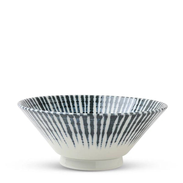 A white ceramic bowl with a blue hand-painted radial stripe pattern, shown against a plain white background.