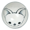 Ceramic bowl with a cute black outline of an animal face, featuring big ears and a small nose, on a white background. Playful and charming design.