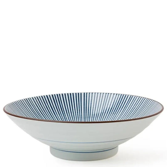 A ceramic bowl with a white exterior and a blue striped interior, featuring a thin brown rim and a small pedestal base, set against a plain white background.