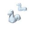 Two white ceramic horse chopstick rests on a white background