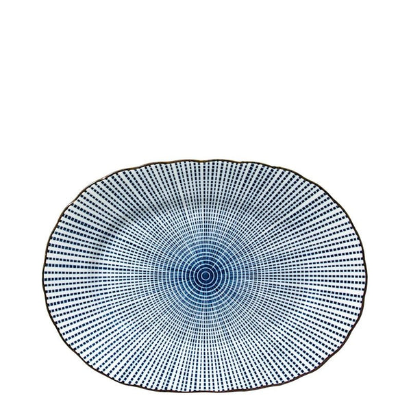 An oval-shaped ceramic plate featuring a blue and white radial dotted pattern that converges to a spiral center, finished with a dark rim, shown against a plain white background.