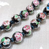 Black porcelain beads with cloisonne and lotus design