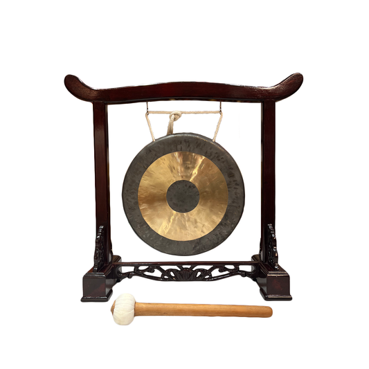 Gong on a stand with a mallet on a white background