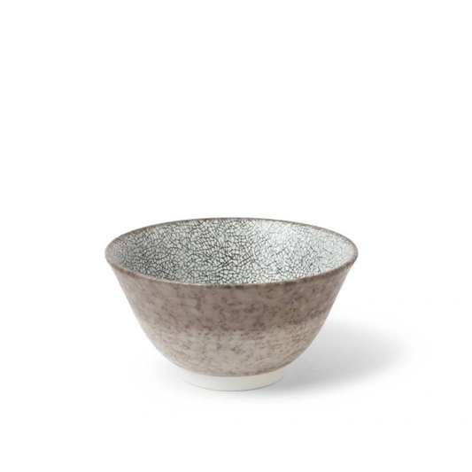 Ceramic bowl with textured surface on a white background