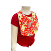 Red bib with fish pattern worn by a mannequin on a white background