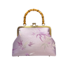 Lilac purse with bamboo handle
