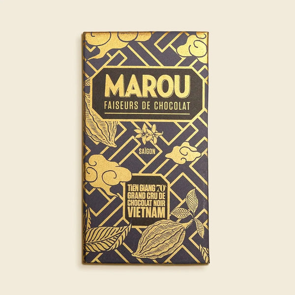 Marou chocolate bar packaging with gold text and design on a beige background