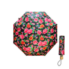 Floral-patterned umbrella open and closed on a white background