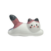 Ceramic cat-shaped object with white, purple, and black colors on a white background.