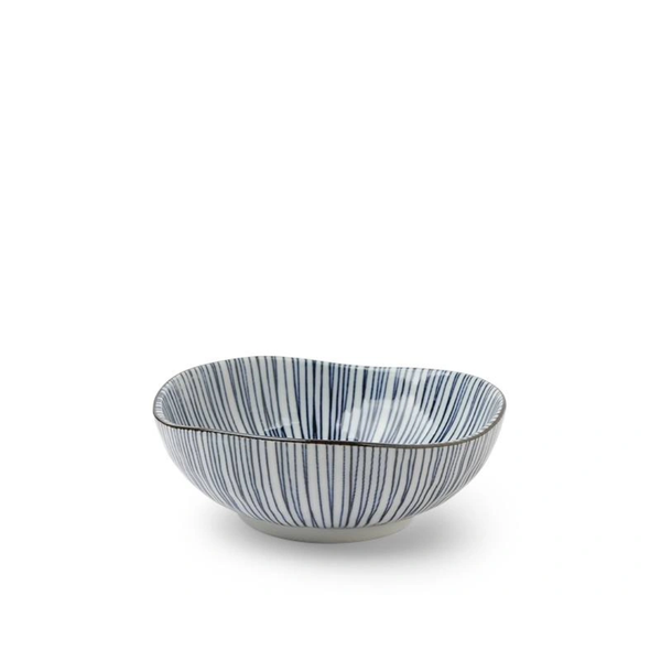 Ceramic bowl with blue and white striped pattern on a white background