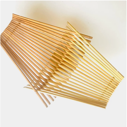 Folding bowl made with 20 pairs of upcycled chopsticks, one side in tea stained and opposite side in natural color