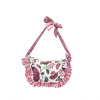 Pink and white purse with peacock and floral design on white background