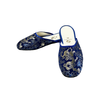 Pair of blue embroidered slippers on a white background