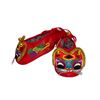 Red embroidered shoes with colorful designs on a white background