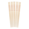 Set of wooden chopsticks with red patterns on a white background