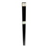 Pair of black chopsticks with gold accents on a white background
