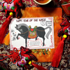 Card with a horse illustration and text on an orange fabric background with decorative elements.