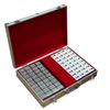 An open silver metal carrying case with a red interior, containing a set of playing cards and multiple small silver boxes arranged in compartments, photographed on a plain white background.