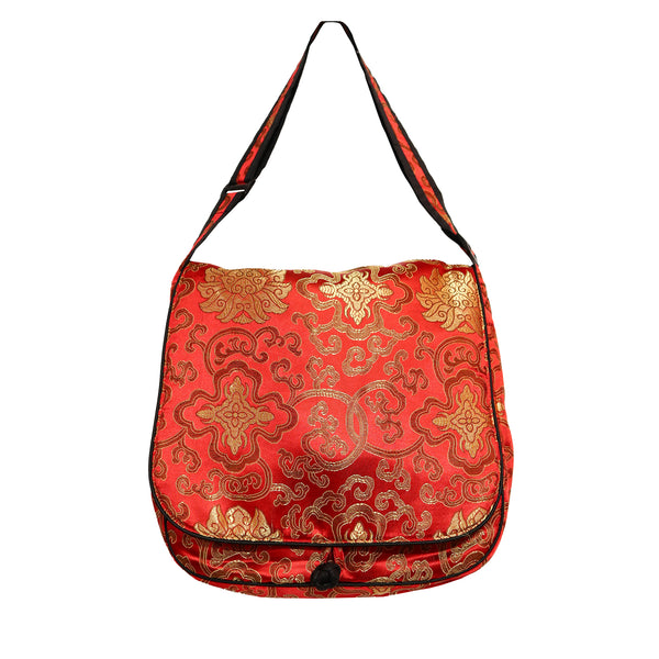 Red brocade messenger bag with gold floral design 