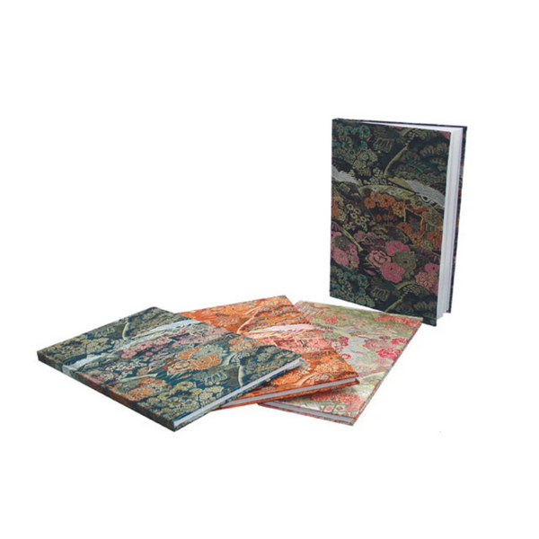 Four brocade notebooks in a variety of beautiful designs