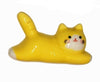 Yellow cat-shaped object on a white background.