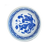 Ceramic dish with blue dragon design on a white background
