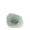 A polished light green bowl with a smooth, rounded surface, photographed on a seamless white background.