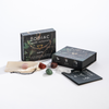 Zodiac crystal collection packaging with crystals on a white background