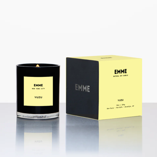 EMME candle and packaging on a white background