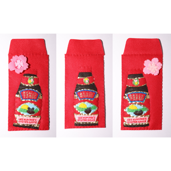 Three red envelopes with a design of a bottle and a flower on a white background