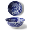 Blue and white ceramic bowls with intricate patterns on a white background