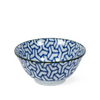Ceramic bowl with blue and white geometric pattern on a white background