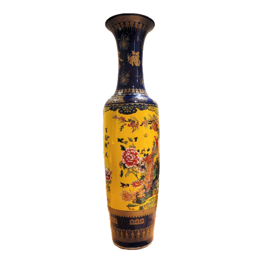 Decorative vase with floral patterns on a yellow background