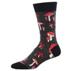 Sock with red and white mushroom pattern on a dark background
