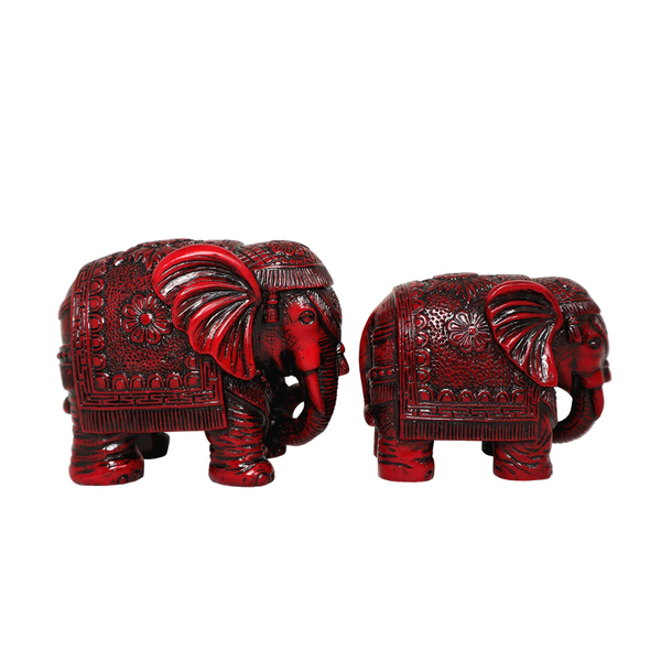 Red lacquer elephant figurines