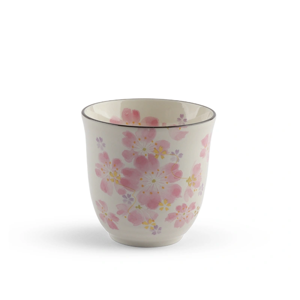 Ceramic mug with floral pattern on a white background
