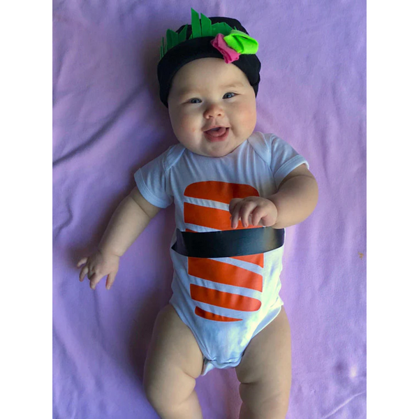 Chubby baby in a sushi onesie and cap