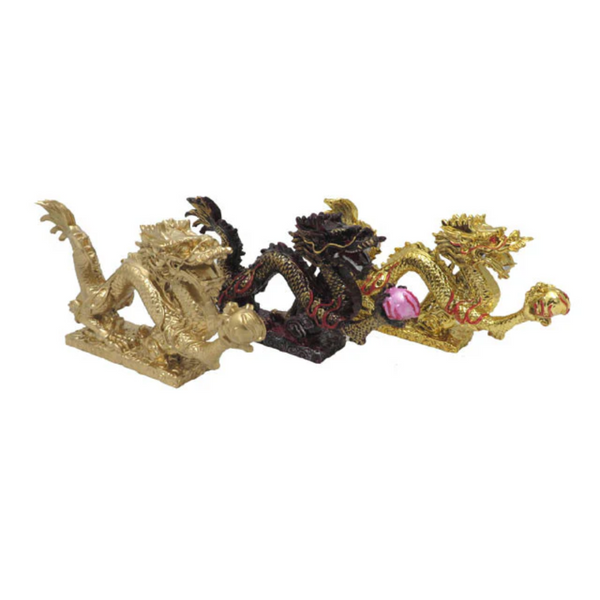 Three dragon with pearl statues. There's one in resin, gold and brass