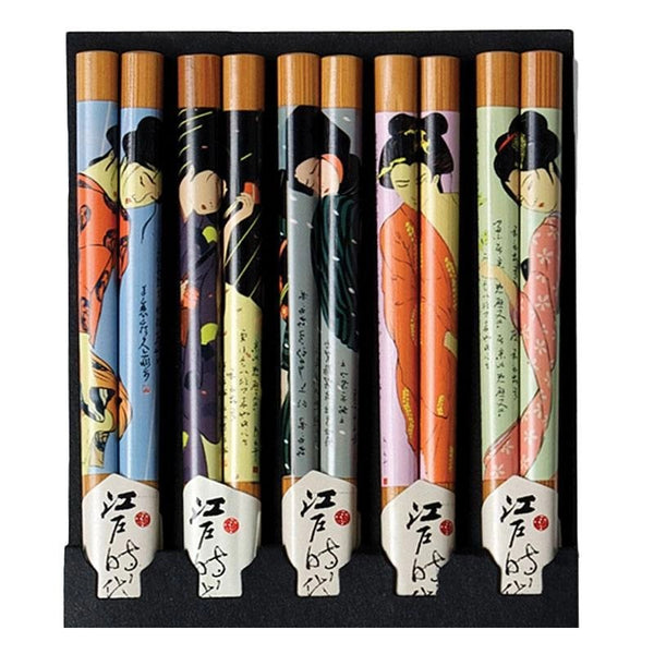 A set of five chopsticks, featuring wood-toned handles and colorful printed Japanese geisha designs on the upper sections.