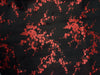 Cherry/Plum Blossom Brocade Fabric - closeup of red on black