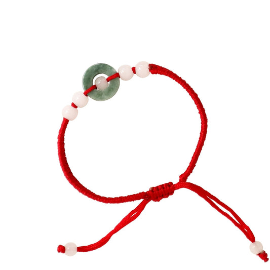Jade bracelet with red knots