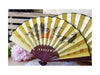 Yellow folding fan with dragon