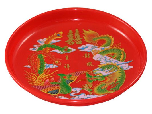 Festive round red tray with brightly colored dragon and phoenix, and gold double happiness character