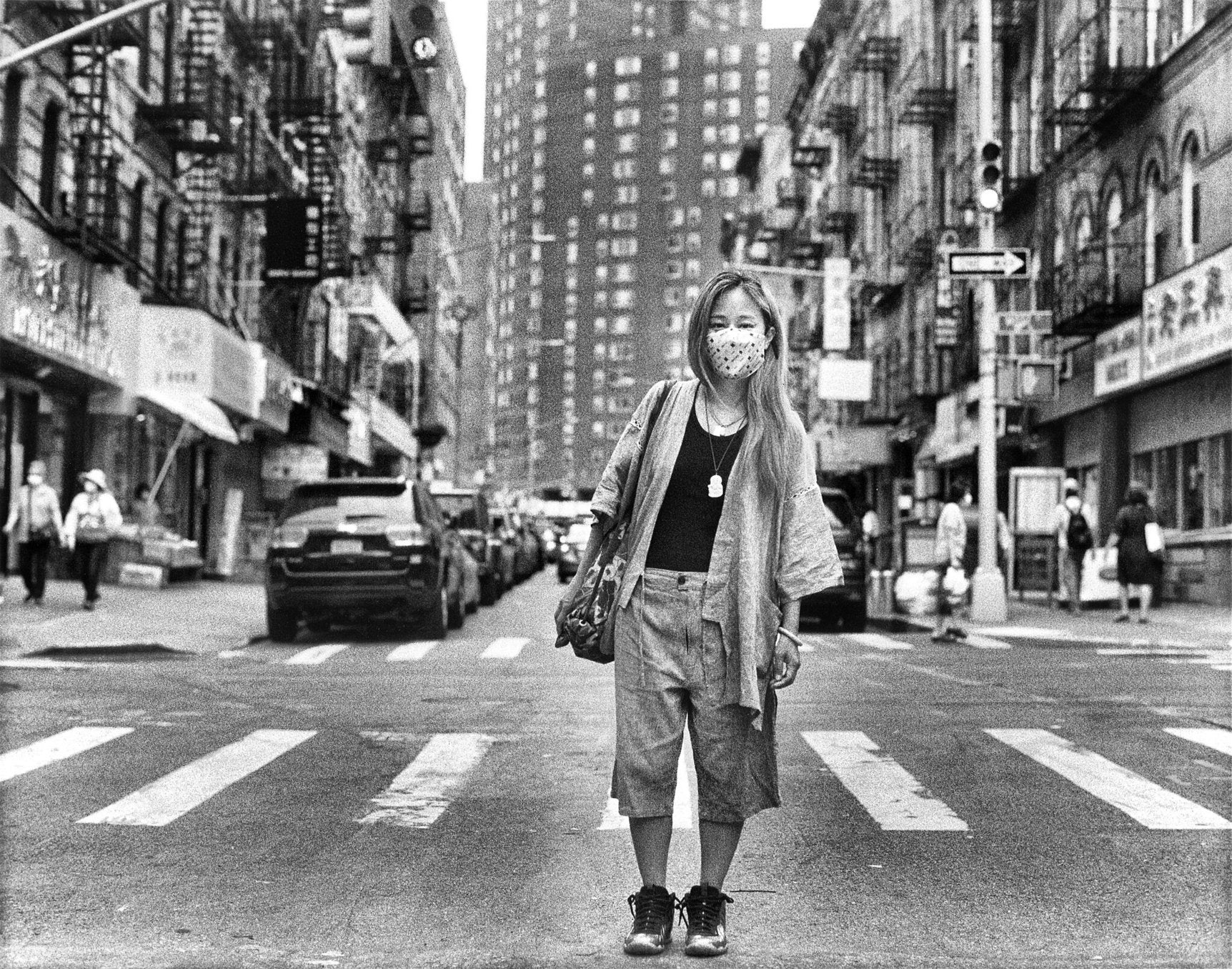 Artist Amanda Phingbodhipakkiya in her We are Chinatown exhibition in Pearl River Mart